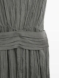 Textured flowing fabric dress with sash belt