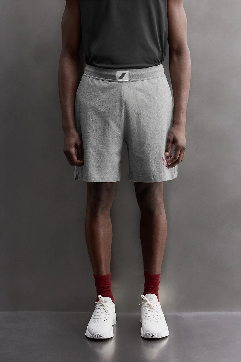 EMBROIDERED SIDE STRIPE 9" SHORTS