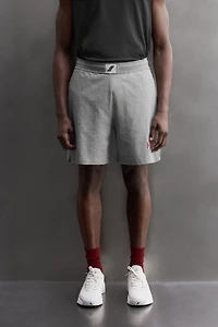 EMBROIDERED SIDE STRIPE 9" SHORTS