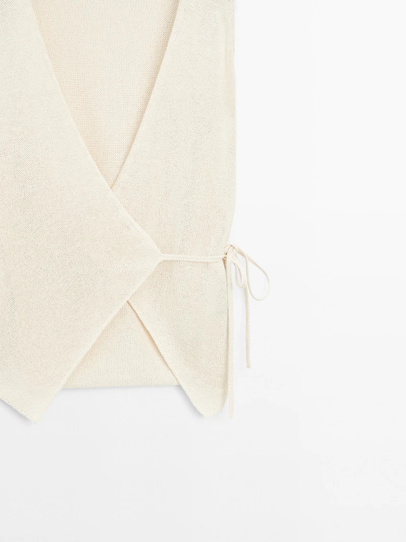 Knit crossover waistcoat with drawstring