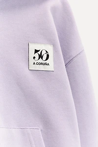 6 YEARS/ 50TH ANNIVERSARY LABEL ZIP-UP SWEATSHIRT