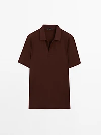 Textured polo shirt with hidden button