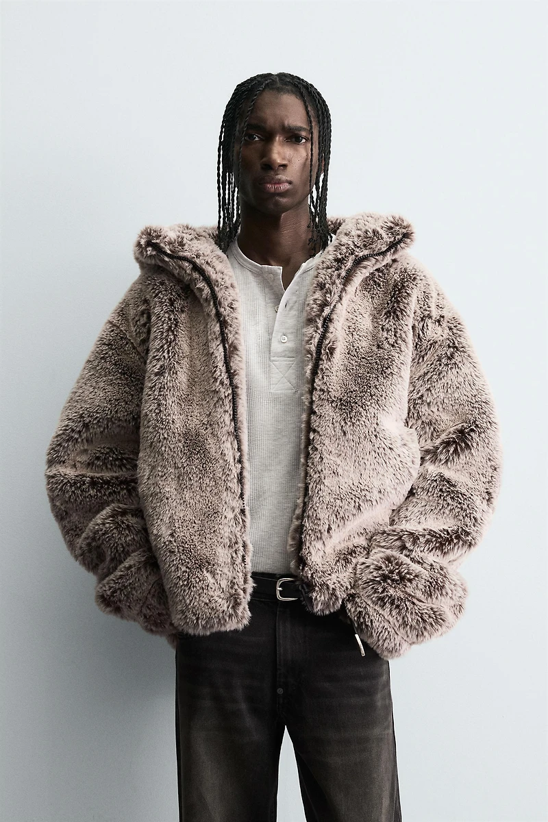 BLOUSON EFFET FOURRURE À CAPUCHE