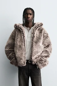 BLOUSON EFFET FOURRURE À CAPUCHE