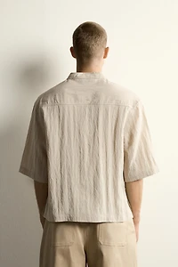 FLOWY POLO SHIRT