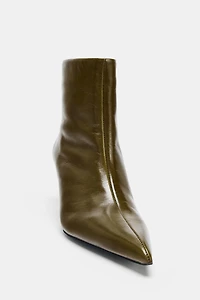 LEATHER CURVED HEEL ANKLE BOOTS