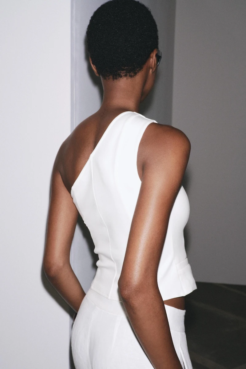 TOP GILET ASYMÉTRIQUE INTERLOCK
