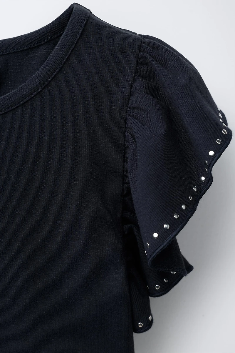 RUFFLED BODYSUIT WITH STUDS AND MODAL