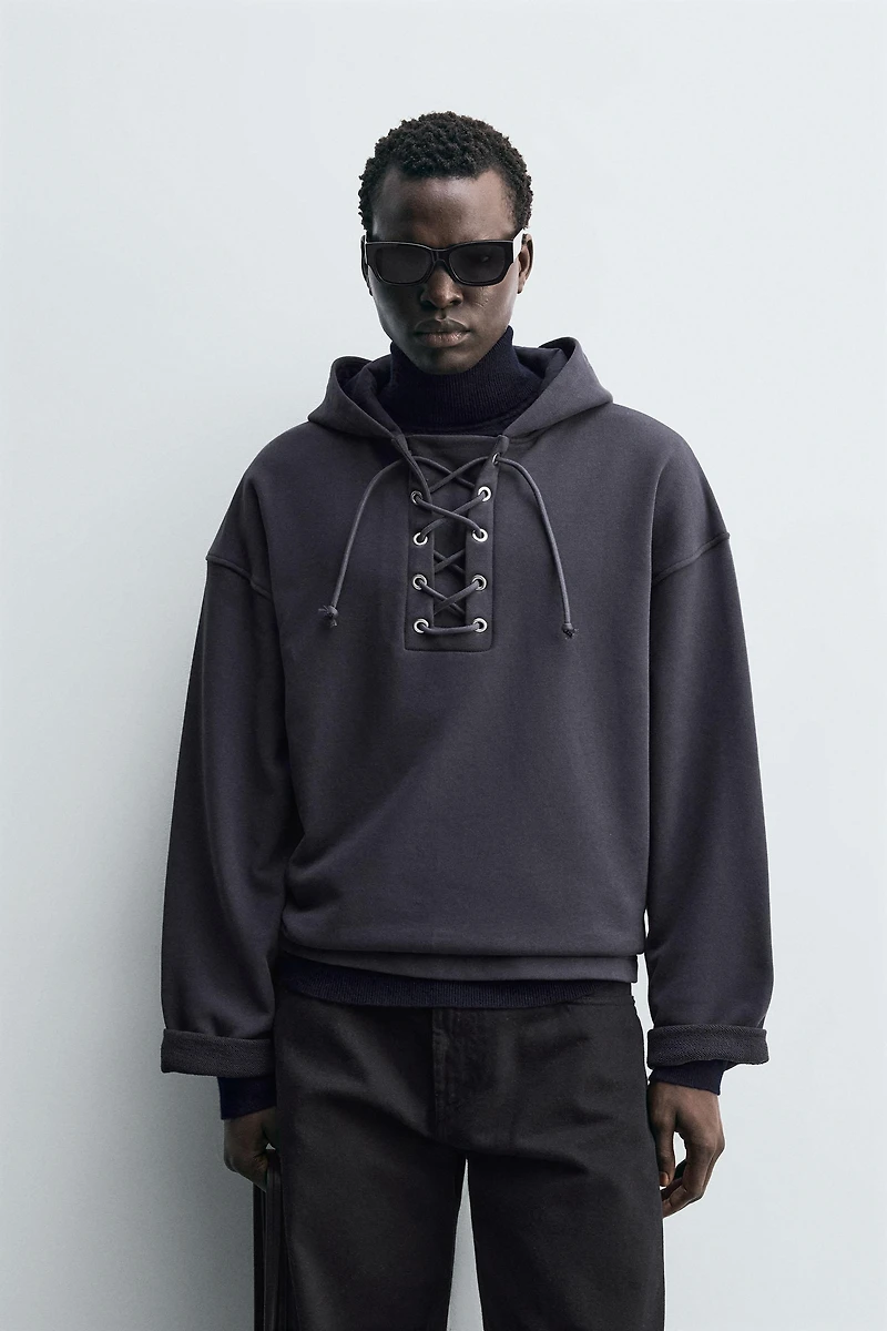 TEXTURED DRAWSTRING SWEATSHIRT