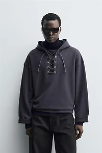 TEXTURED DRAWSTRING SWEATSHIRT