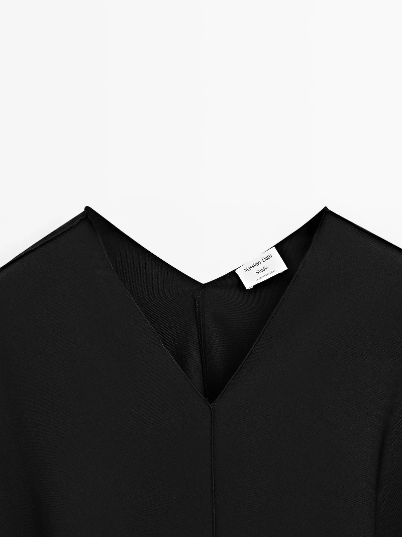Cape-style blouse with asymmetric cut - STUDIO