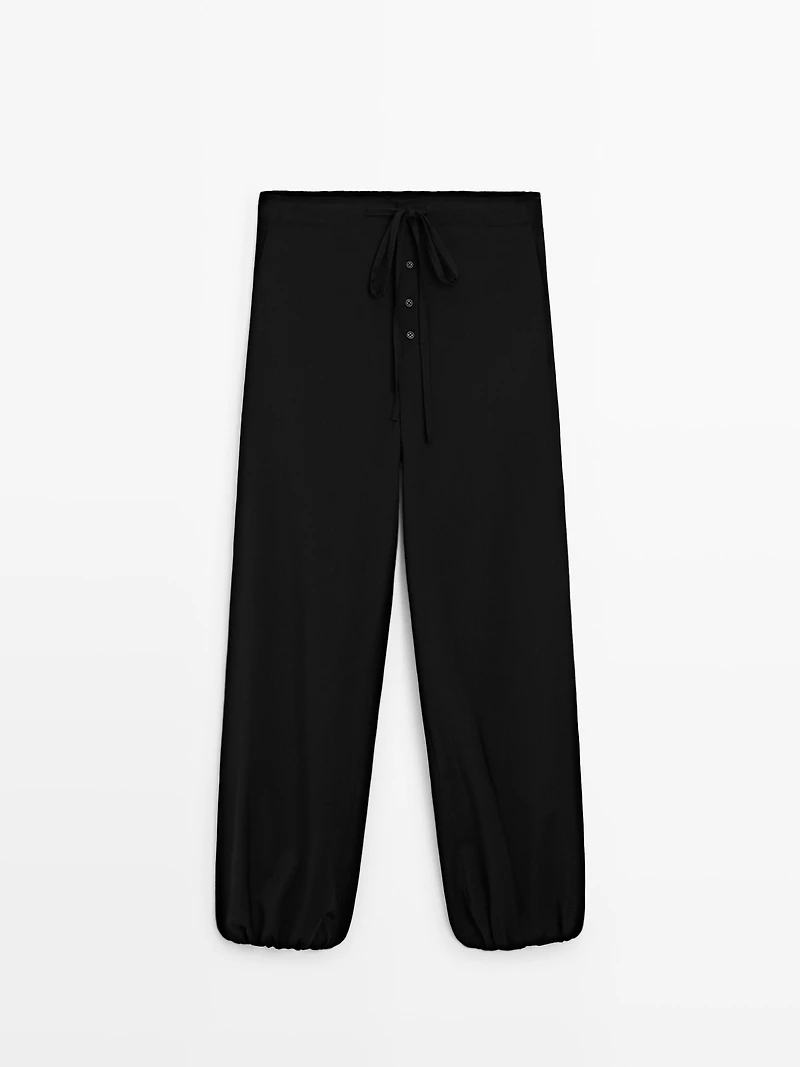 Wool sarouel trousers with tie detail