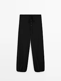 Wool sarouel trousers with tie detail