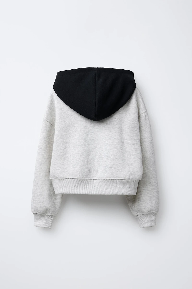 FLOCKED TEXT HOODIE