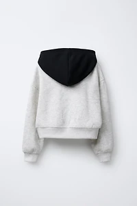 FLOCKED TEXT HOODIE