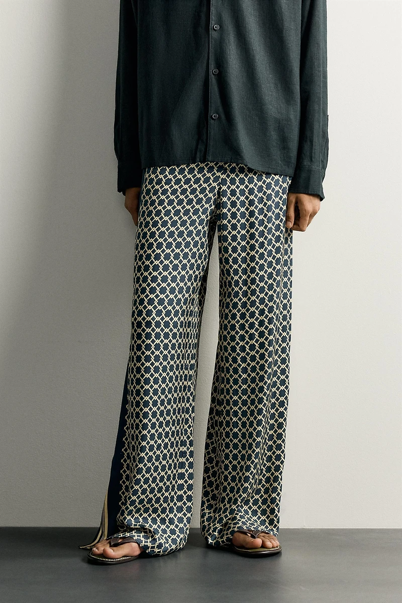 LIMITED EDITION FLOWY PANTS WITH SIDE BANDS