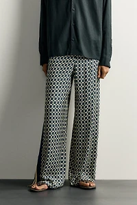 LIMITED EDITION FLOWY PANTS WITH SIDE BANDS
