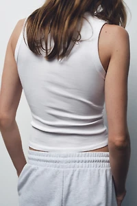 EMBROIDERED TEXT TOP
