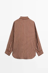 Flowing striped shirt with batwing sleeves