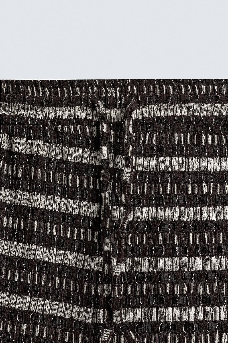 PANTALON JACQUARD AJOURÉ