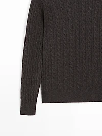 Pull en maille tressée à col rond