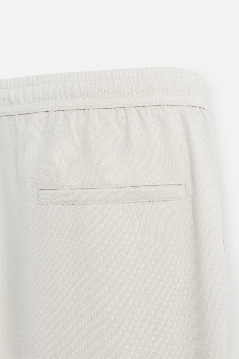 RELAXED FIT FLOWY PANTS