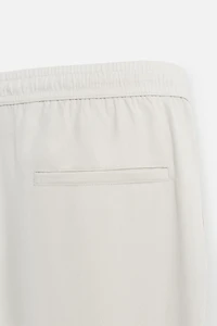 RELAXED FIT FLOWY PANTS
