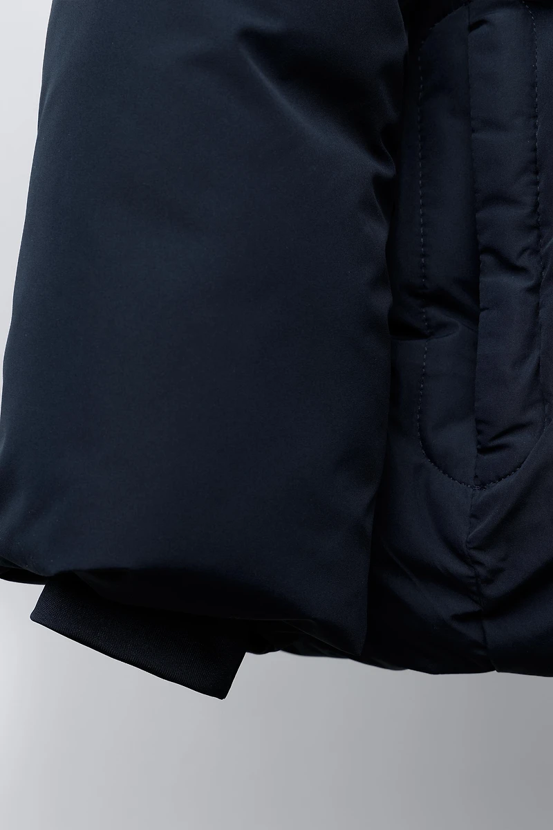 BLOUSON MATELASSÉ À CAPUCHE DÉPERLANT