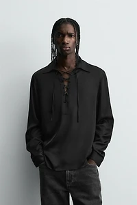 CHEMISE POLO FLUIDE À LACET