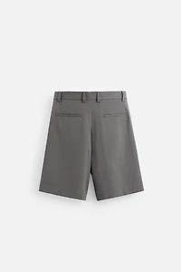 PLEATED RELAXED FIT SHORTS
