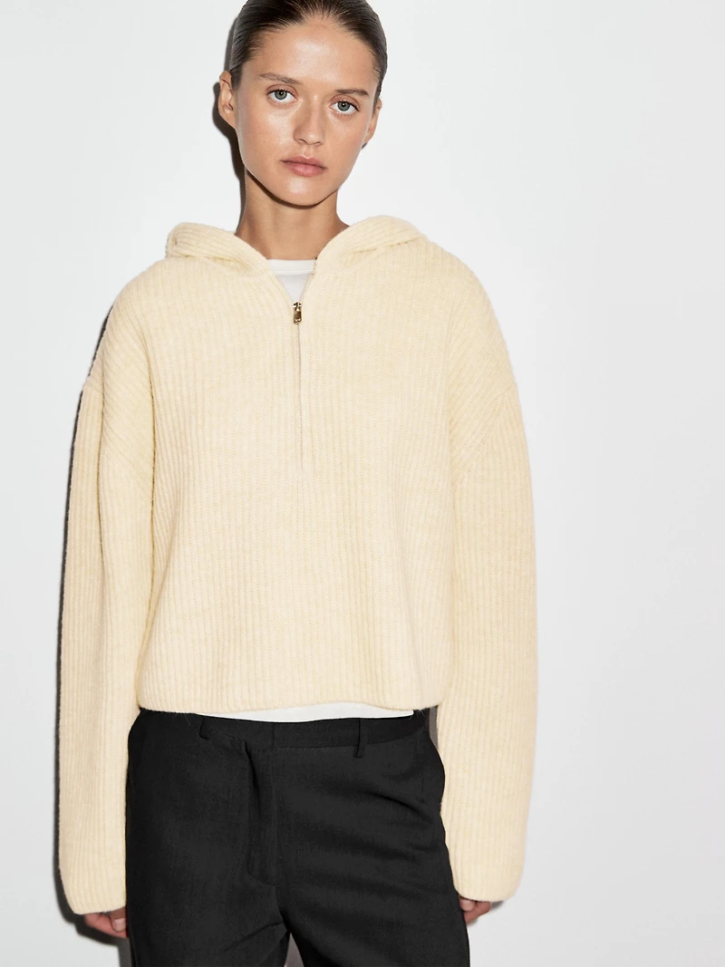 Wool blend sweater with hood detail