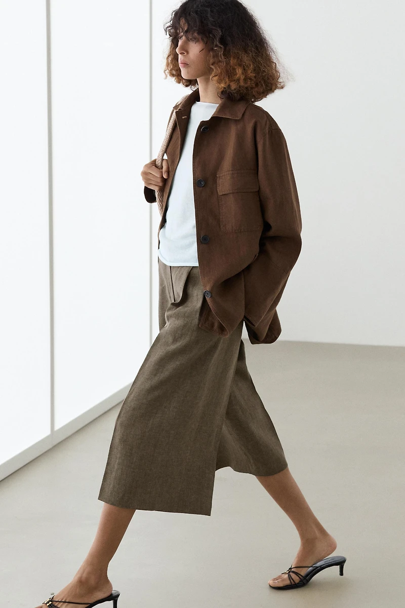 Flowing melange linen Bermuda shorts