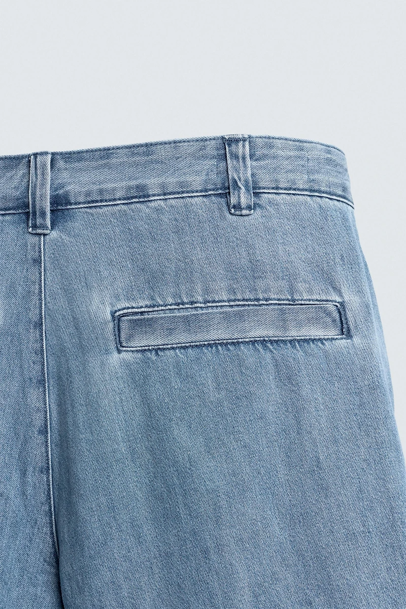 RELAXED FIT PLEATED DENIM SHORTS