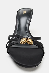 SANDALES À TALONS ET BRIDES