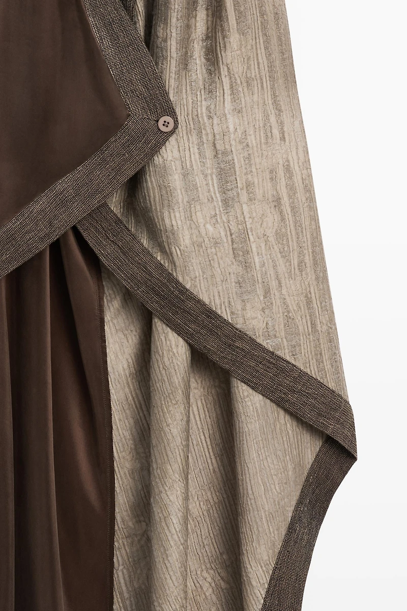 Flowing wrap top with mixed fabric detail