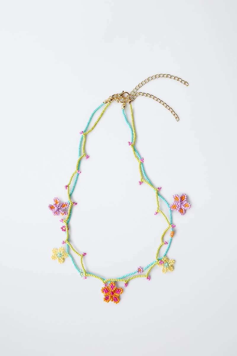 TWO-PACK OF BEADED FLOWER NECKLACES