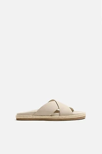 CROSSED LEATHER SANDALS