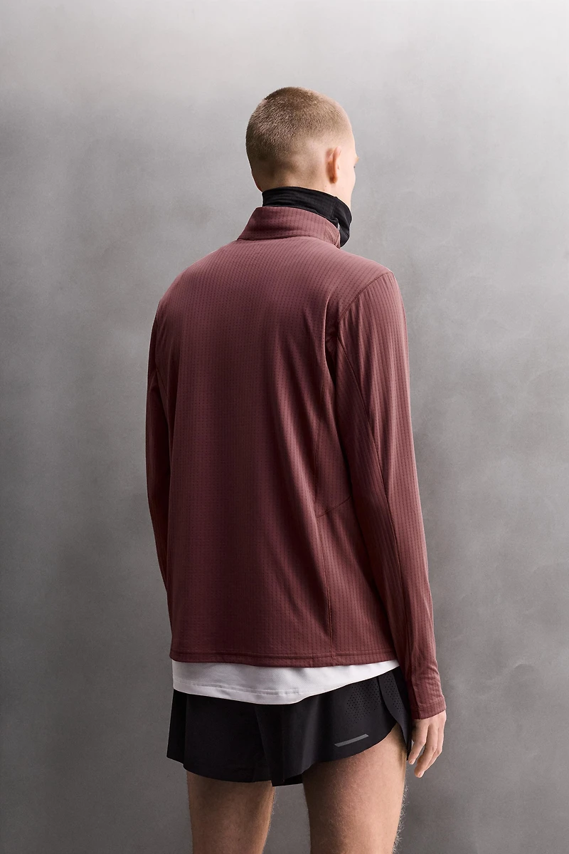 COMBINATION POCKET QUARTER-ZIP SWEATSHIRT
