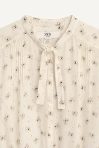 BLOUSE IMPRIMÉE À NŒUDS ÉDITION LIMITÉE