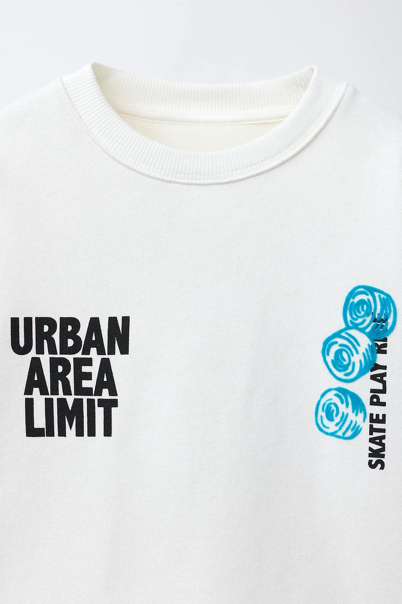 FLOCKED TEXT SWEATSHIRT