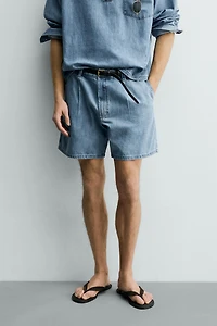 RELAXED FIT PLEATED DENIM SHORTS
