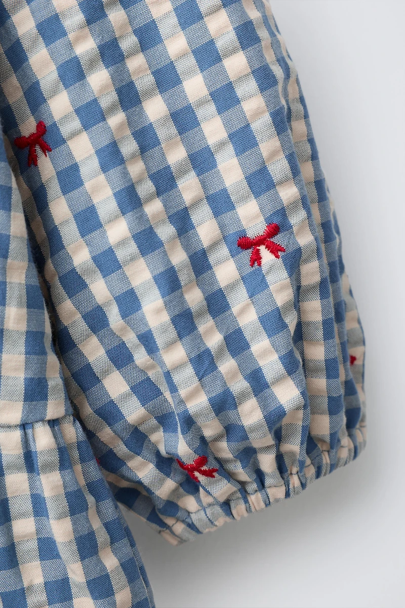 PLAID DRESS WITH EMBROIDERED BOWS
