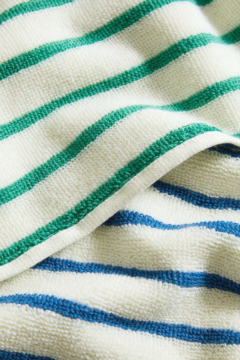 KIDS’ REVERSIBLE STRIPED BATH TOWEL