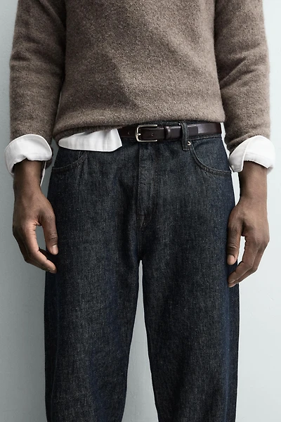 CEINTURE EN CUIR HABILLÉE