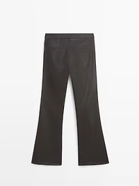 Waxed flare fit trousers