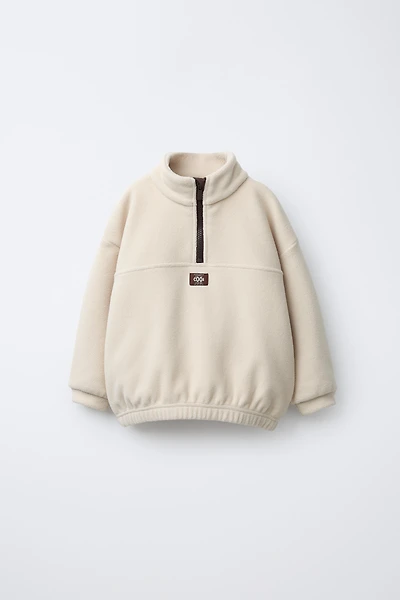 SWEAT POLAIRE ZIPPÉ