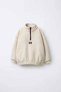 SWEAT POLAIRE ZIPPÉ