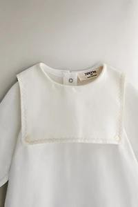 CHILDREN'S FOOTED ROMPER WITH BIB COLLAR
