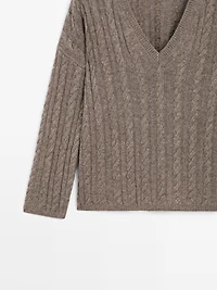 Cable-knit V-neck sweater