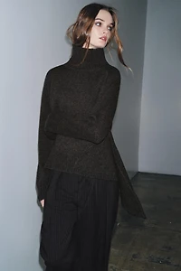 WOOL SWEATER WITH ASYMMETRIC HEM